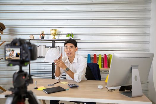 Asian man  blogger broadcasting a video for selling product online .Shopping online concept