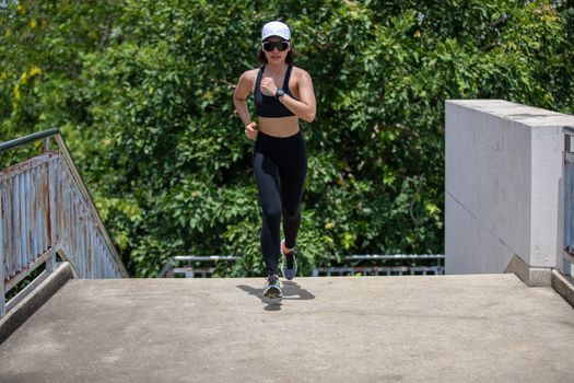 Asian women Running and jogging during outdoor on city run