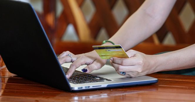 woman asian using smartphone and credit card shopping online