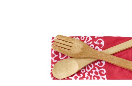 Wooden kitchen utensils isolated on white background