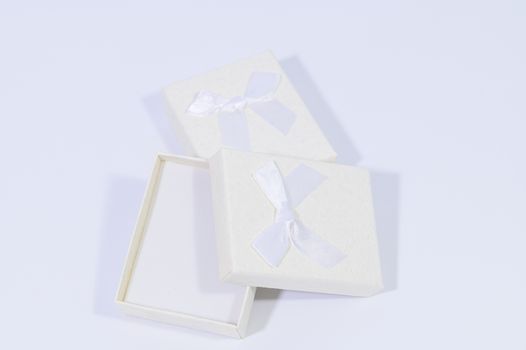 Creamy white gift box In the white background