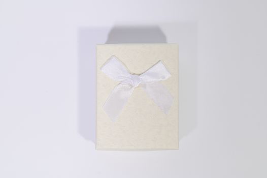 Creamy white gift box In the white background