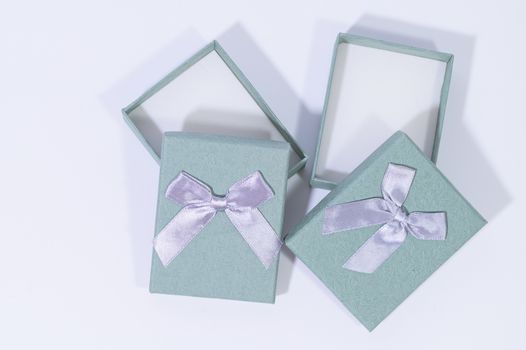 Blue-green gift box In the white background