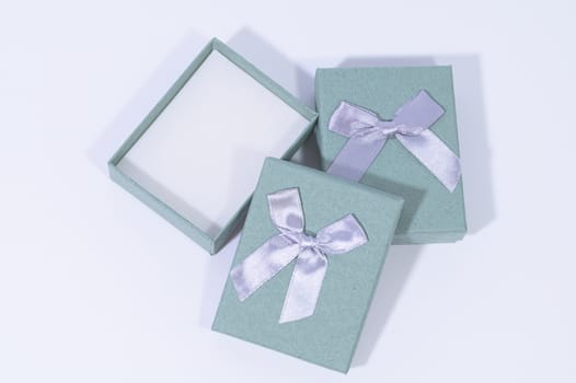 Blue-green gift box In the white background