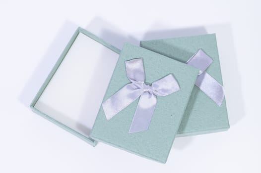 Blue-green gift box In the white background