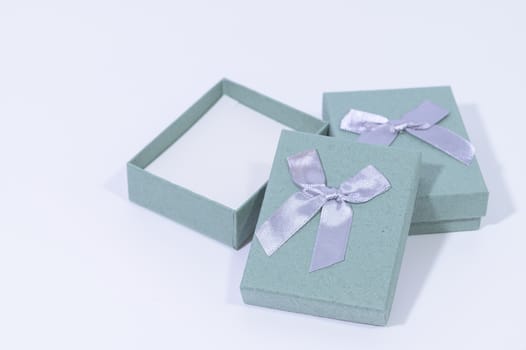 Blue-green gift box In the white background