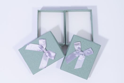 Blue-green gift box In the white background