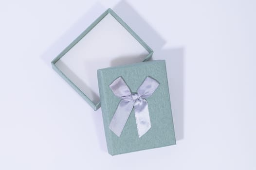 Blue-green gift box In the white background