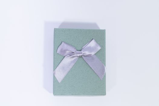 Blue-green gift box In the white background