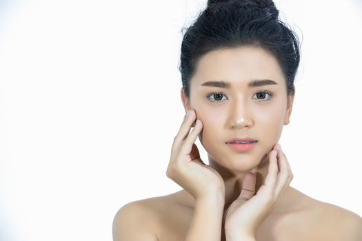 Beauty asian women fashion perfect skin Portrait and Smiling young woman on white background.