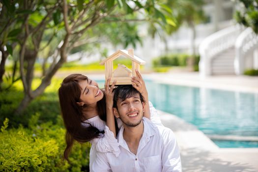 Happy Romantic Couples lover talking and drinking wine while having a picnic