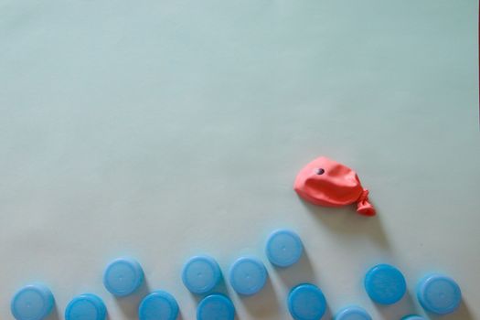 Conceptual photo of a balloon shaped like a fish to show concept of ocean pollution and environmental damage