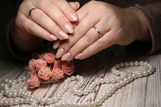 Beautiful woman's nails with beautiful christmas manicure studio