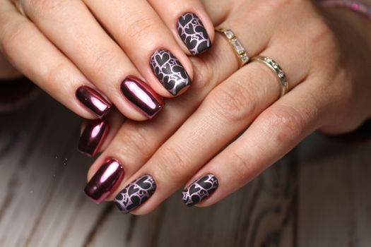 Beautiful woman's nails with beautiful christmas manicure studio