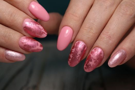 glamorous manicure of nails on beautiful female hands