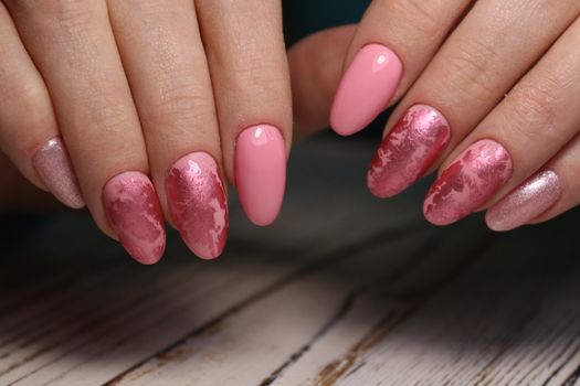 manicure with long nails on a trendy texture background