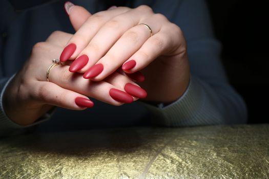 Beautiful woman's nails with beautiful christmas manicure studio