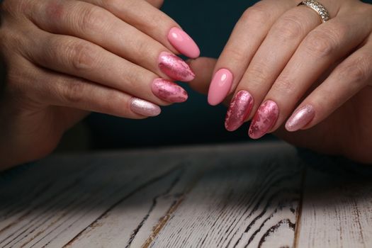 gel lacquer manicure on a textured trendy background