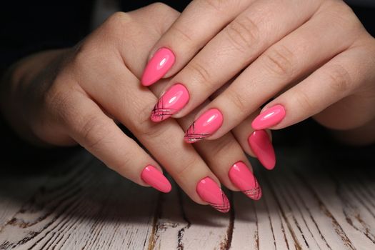 glamorous manicure of nails on beautiful female hands