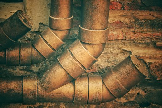 Rustic metal pipes showing a steam punk themed background