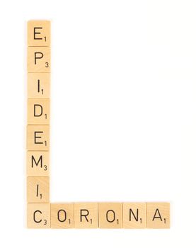 Corona epidemic scrable letters, isolated on a white background