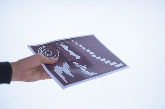 Businessman hand holding a document. Scenes white background.