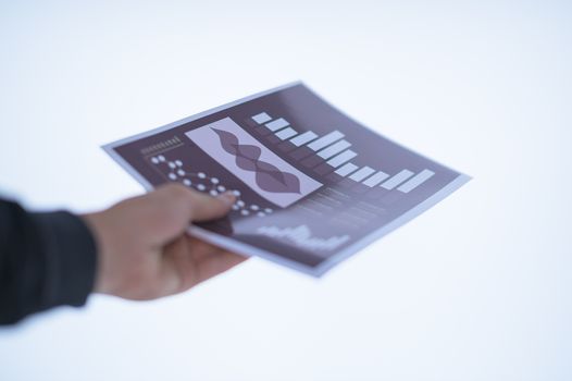 Businessman hand holding a document. Scenes white background.