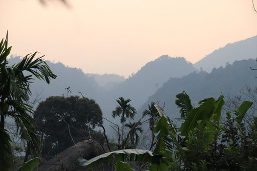 Silhouettes of the mountains in the light of dawn in Ha giang, Vietnam