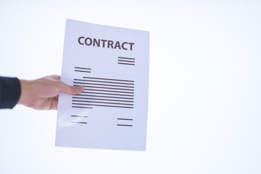 Businessman hand holding a document. Scenes white background.