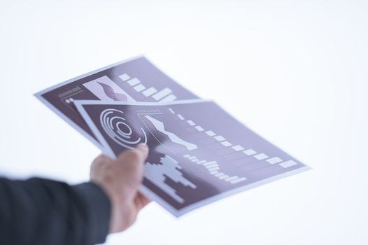 Businessman hand holding a document. Scenes white background.