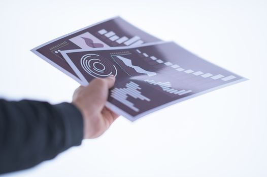 Businessman hand holding a document. Scenes white background.