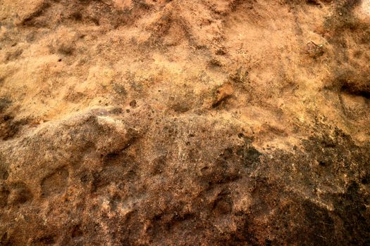 heavy rust copper granite stone surface of cave for interior wallpaper and background