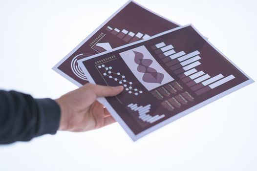 Businessman hand holding a document. Scenes white background.