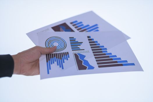 Businessman hand holding a document. Scenes white background.