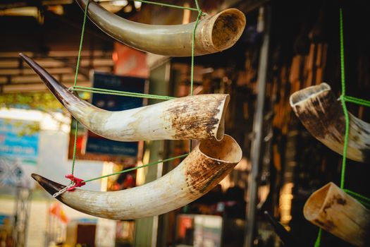 Buffalo horn decoration sold as tourist souvenirs in Buon Don village of Dak Lak Province in the Central Highlands of Vietnam that shows the life, culture and tradition of Vietnamese ethnic tribe