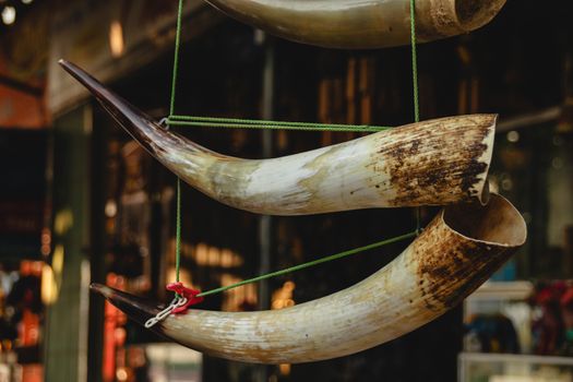 Buffalo horn decoration sold as tourist souvenirs in Buon Don village of Dak Lak Province in the Central Highlands of Vietnam that shows the life, culture and tradition of Vietnamese ethnic tribe