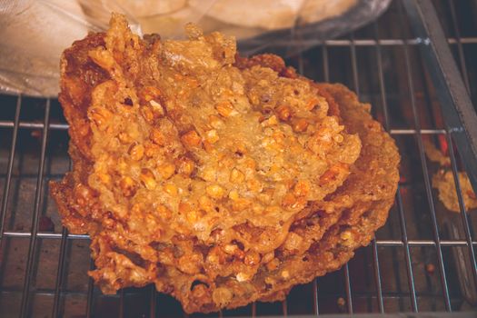 Bánh cay or Vietnamese cassava and corn fritter, a popular street food in the south of Vietnam