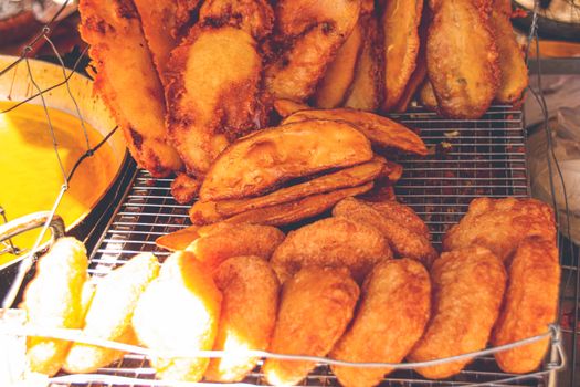 Bánh cay or Vietnamese cassava and corn fritter, a popular street food in the south of Vietnam