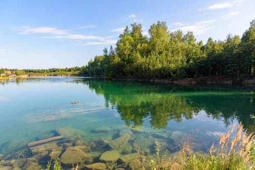 Flooded old quarry in Grodek park in Jaworzno, Poland