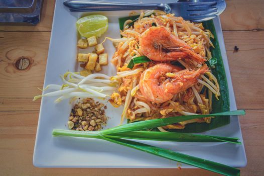 Pad thai, the most iconic and famous Thai dish for tourist that shows the local culture and cuisine in Thailand