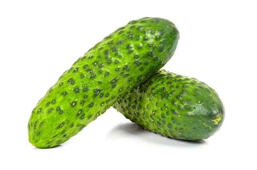 Fresh cucumbers isolated on white background with clipping path