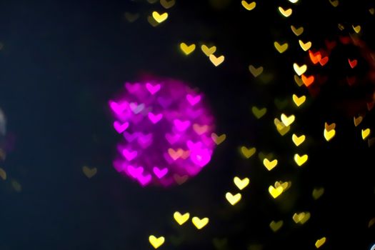 magenta ball abstract bokeh and blur heart shape love valentine's day colorful night light