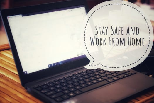Photo and text overlay promoting work from home as a way to cope with the covid-19 pandemic, staying safe and living the new normal lifestyle