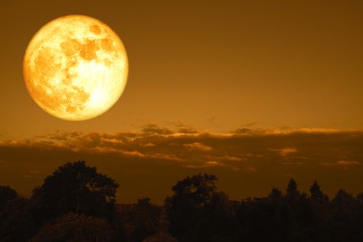 full crow moon back on silhouette cloud and mountain on night sky, Elements of this image furnished by NASA