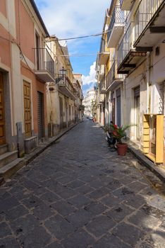 View of picturesque narrow street in town of Pizzo, Calabria, Italy