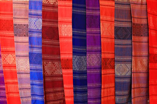 Close up colorful Laos’s silk scarf background