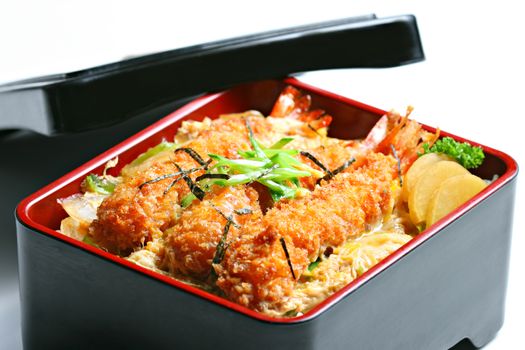 Ebi Tempura Toji Don. Prawns in tempura batter with egg, mushroom, & onion served in rice box