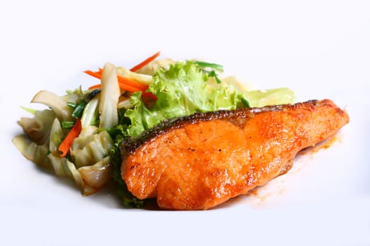 Grilled fresh salmon with fresh salad leaf