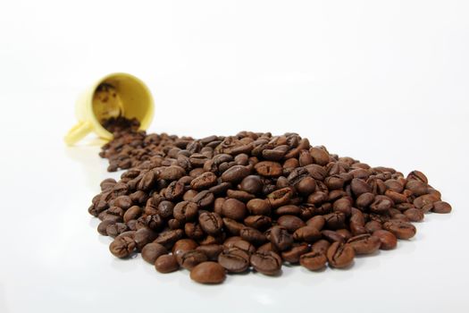 Roasted coffee beans on white background