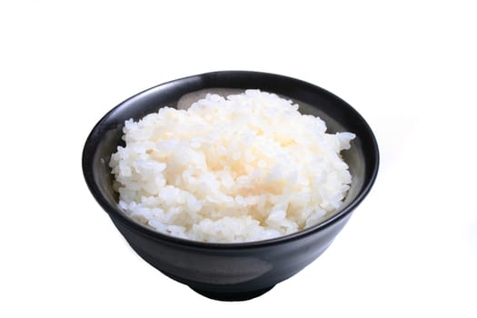 Japanese rice in earthen cup isolated on a white background